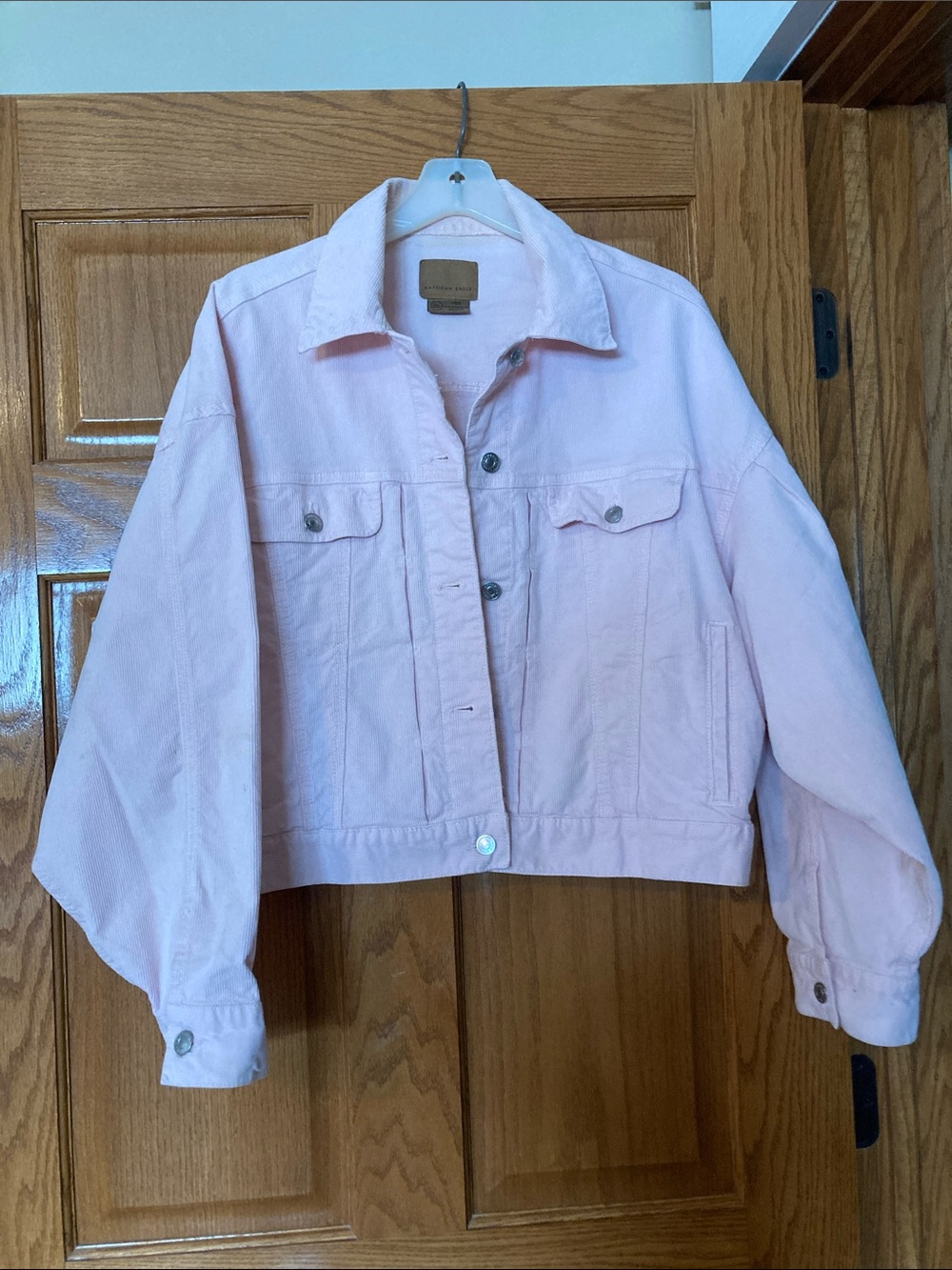 American Eagle cropped pink corduroy jacket.